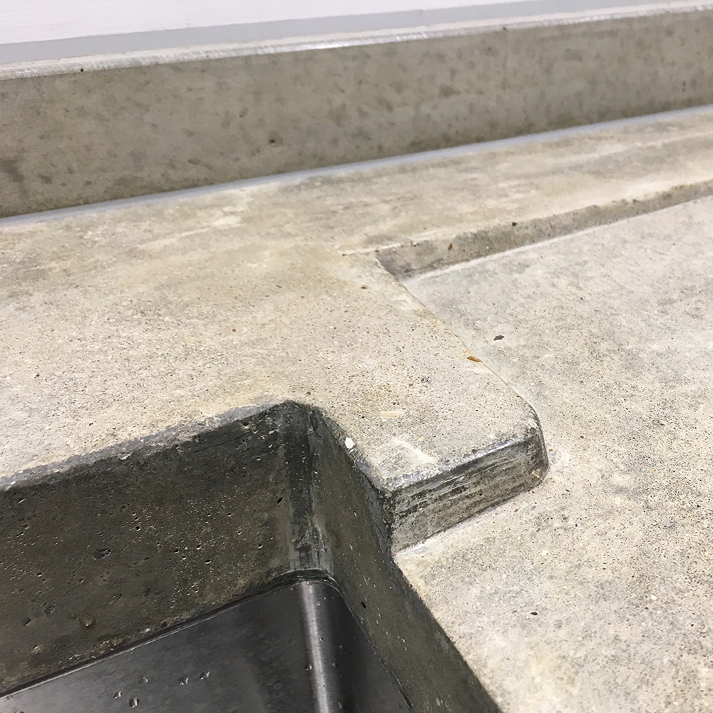 Conscious Forms - bermondsey london polished concrete worktop drainer sink detail
