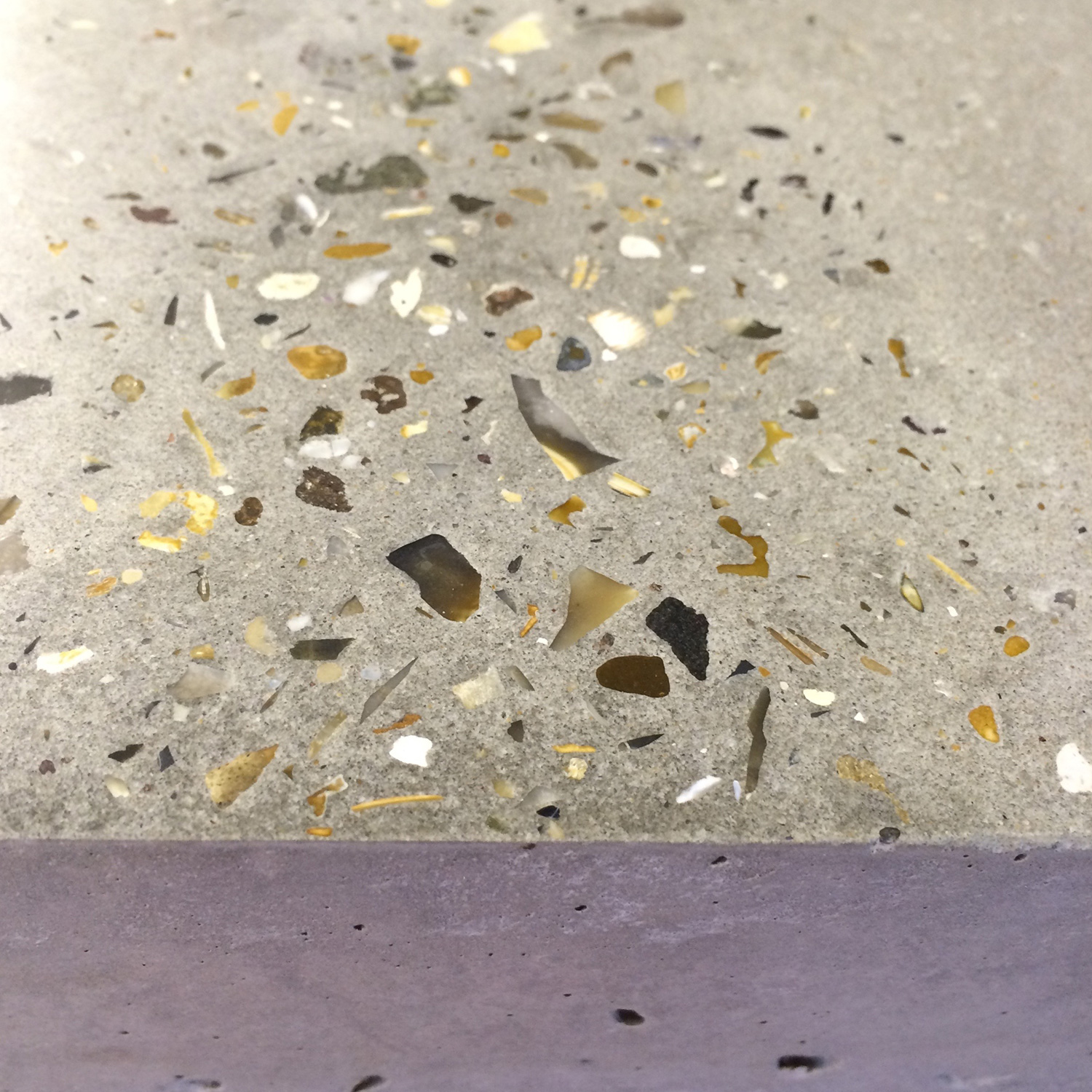 Conscious Forms - polished concrete worktop samples heavily ground exposed aggregate